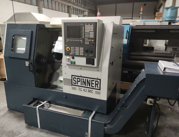 SPINNER TC 42-MC 810D Siemens Metal Processing Lathes CNC Lathe Machine has 16 position turret with 8 pos. live tooling. Machine is without
tailstock ! We will supply holder also for live tooling and a chuck along with
the machine. Germany