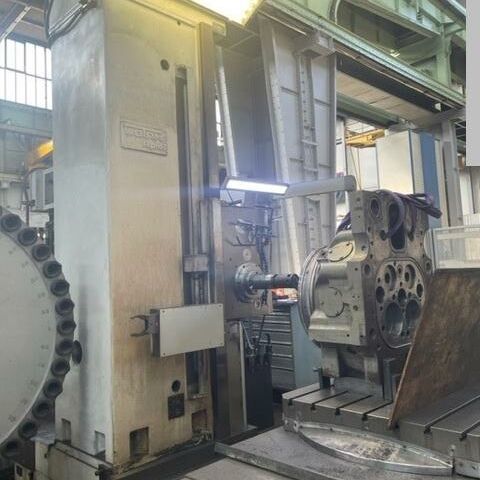 WOTAN Rapid 1 R/6 (CNC)  Metal Processing Boring mills / Machining Centers / Drilling machines Table Type Boring and Milling Machine Machine was reconditioned and retrofitted with Siemens 840 D control in 2003.
Machine has a 40 position ATC, 5 CNC axes with ball screw drives (X,Y,Z,W,B),
housing around machine with safety doors, cooling arrangement built in 2020 and
new spindle drive Siemens built in 2008. Germany