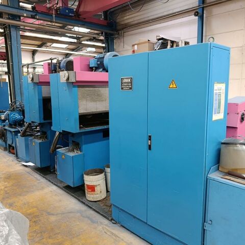 LÖSER SO-790  Metal Processing Bar processing / Bar manufacturing Centreless grinding and polishing machin Belt grinding line with 2 grinding units for pipes and bars. Surface of round
material is grinded by through feeding. Germany