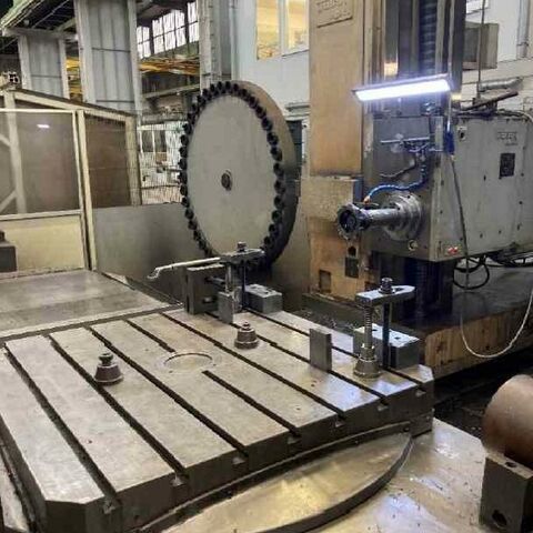 WOTAN Rapid 1 R/6 (CNC)  Metal Processing Boring mills / Machining Centers / Drilling machines Table Type Boring and Milling Machine Machine was reconditioned and retrofitted with Siemens 840 D control in 2003.
Machine has a 40 position ATC, 5 CNC axes with ball screw drives (X,Y,Z,W,B),
housing around machine with safety doors, cooling arrangement built in 2020 and
new spindle drive Siemens built in 2008. Germany