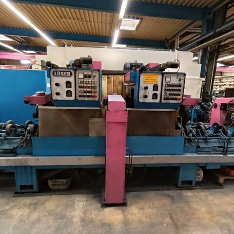 LÖSER SO-790  Metal Processing Bar processing / Bar manufacturing Centreless grinding and polishing machin Belt grinding line with 2 grinding units for pipes and bars. Surface of round
material is grinded by through feeding. Germany